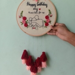 Embroidery Hoop Art with tassels.
