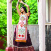 Red circular traditional embroidered panel top paired with multicolor flairy skirt