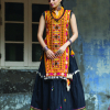 Black geometric motif embroidered panel top paired with color full flairy skirt