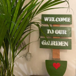 trowel shaped welcome plaque