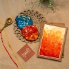 Set of 2 Handcrafted Diary and 2 Wooden Coaster paired with 2 Rakhi ( COMBO 6 )