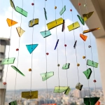Art Gilehri XL Happy windchime hanging
