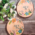 Small texts handpainted on wooden slices