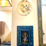 Wooden shelf with Ganesha idol