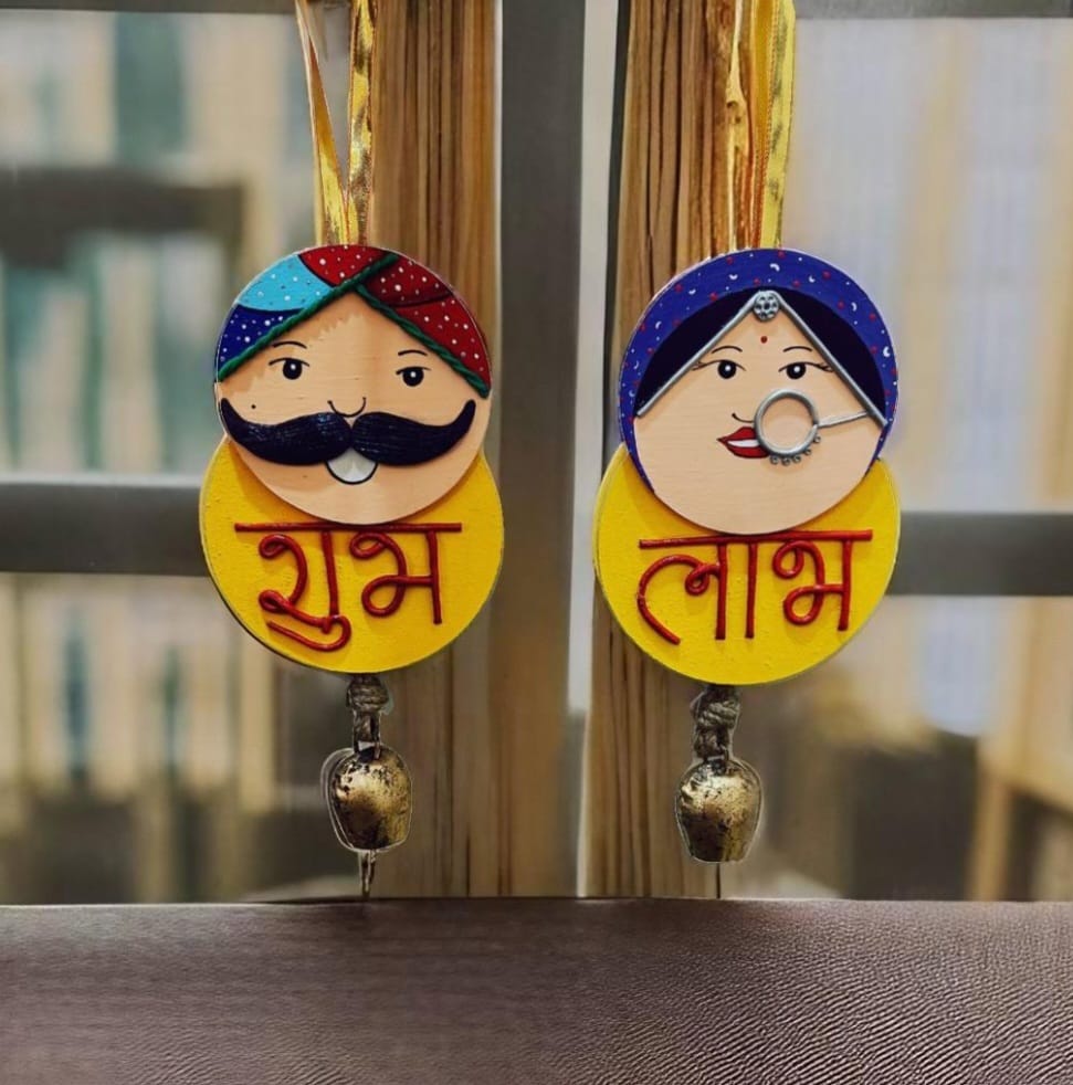Pair of shubh labh with vintage bell