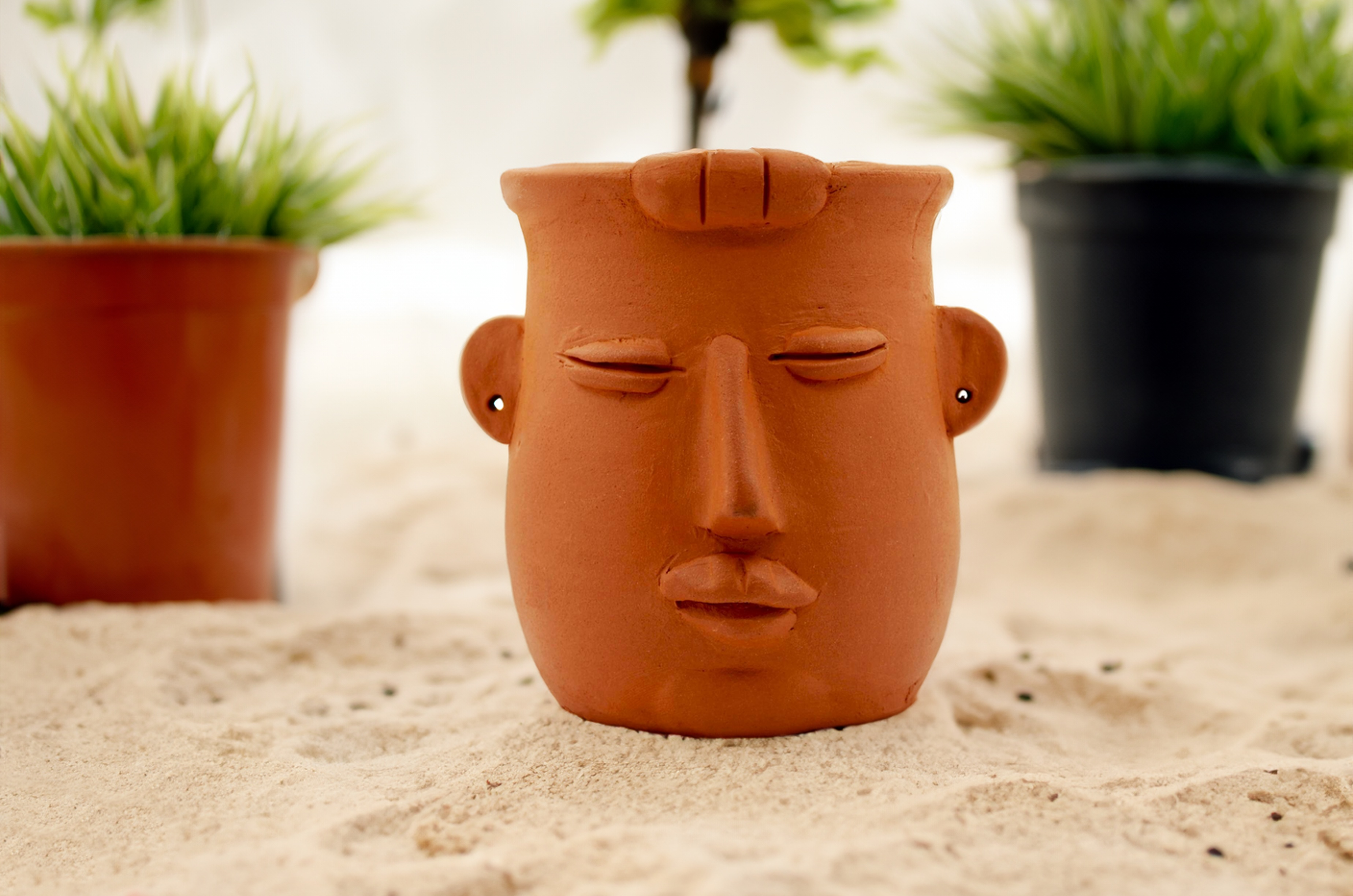 Handmade terracotta table top planter lady face