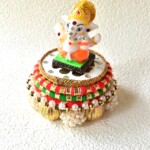 Dev Aasan, Idol Stand, Tea Light Holder in White, Orange, Gold Colours