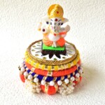 Dev Aasan, Idol Stand, Tea Light Holder in White, Yellow, Orange Colours